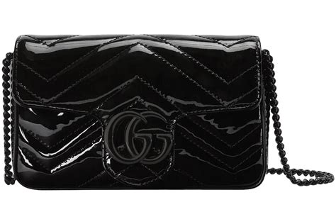 GG Emblem super mini bag in black leather .